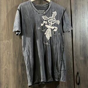 Raw State Royalty grey t-shirt with a cross and wings graphic print.
